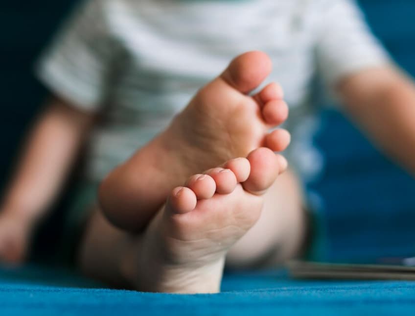 Close-up of bare feet with focus on the toes